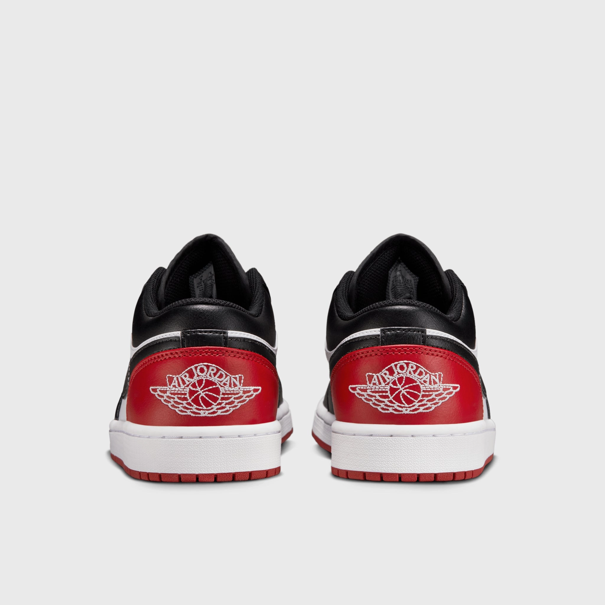 Jordan 1 Low White / Black - Varsity Red